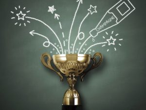 trophy with confetti drawn around it in chalk
