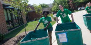 Family, students, and staff help students on freshman move-in day into the Rappahannock Neighborhood. Photo by Evan Cantwell/Creative Services/George Mason University
