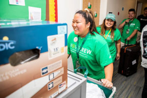 Volunteers help during Move-In Day 2018. Photo by Lathan Goumas/Strategic Communications