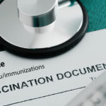 immunization form and stethescope