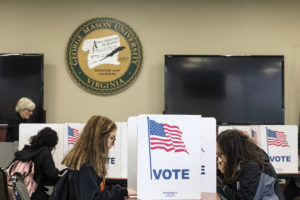 People vote in Merten Hall. Photo by Lathan Goumas/Strategic Communications