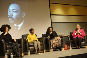 Aja Clark, 2017 Mason alumna (left) moderated the panel discussion at the Evening of Reflection with Naomi Wadler, Trinice McNally and Diane Nash. Photo by John Hollis.