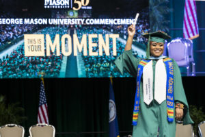 A small moment of a student during her graduation event at Eagle bank arena